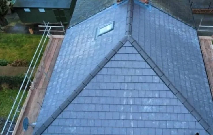 New slate re-roof with a roof window fitted