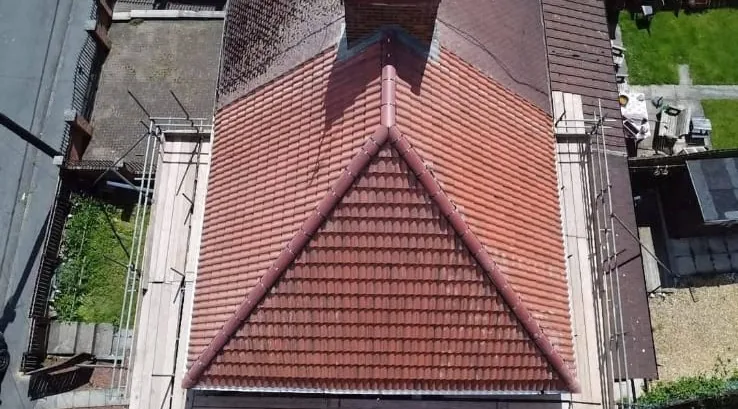 Aerial view of a finished red-tile re-roof on a terraced house